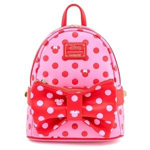 Pink polka dot Disney Loungefly backpack with detachable Fanny pack.